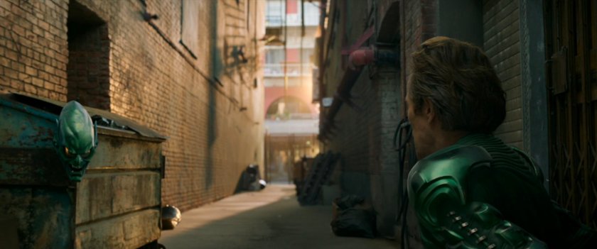 Norman Osborne talks to his mask in an alley.