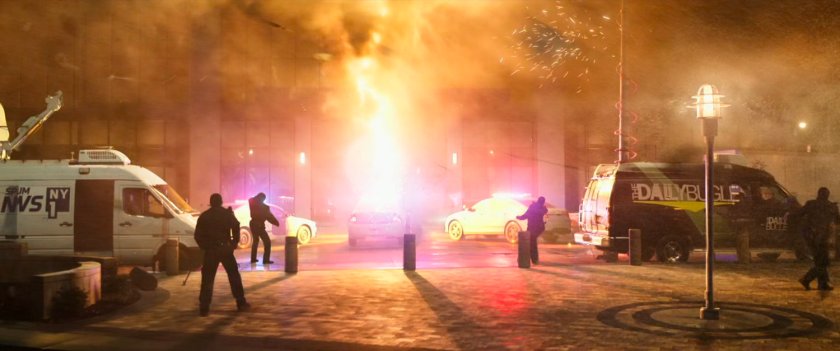 An explosion in front of a Long Island City apartment building, witnessed by by police and reporters.