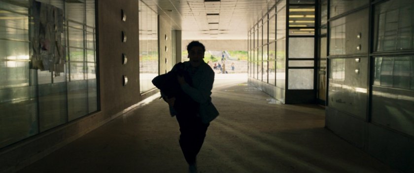 Steven runs through passageway outside Central London Storage.