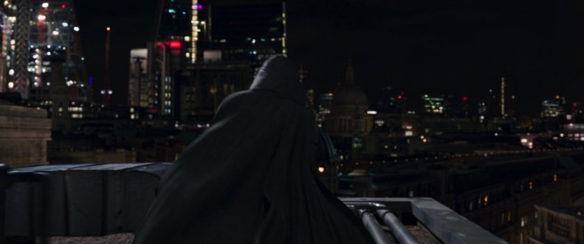 Moon Knight running across a dark London rooftop.