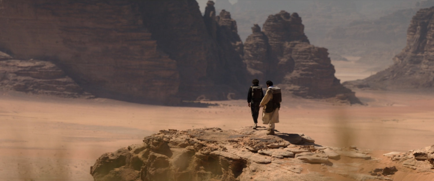 Steven and Layla on a rock outcropping in the Egyptian desert.