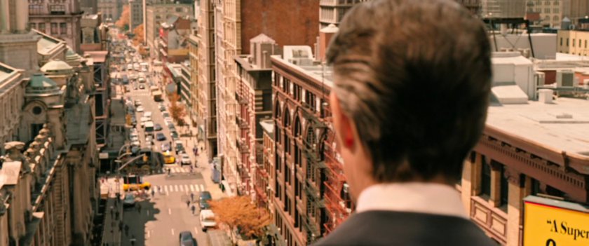 Dr Strange looks down on Soho street in New York City.