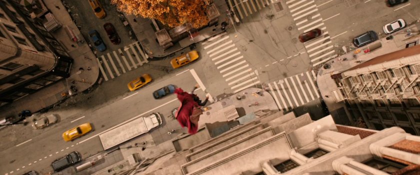 Dr Strange jumps off building onto Soho street in New York City.