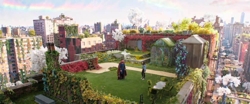 View of America and Dr Strange on flowery New York rooftop.