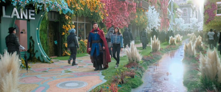 America and Dr Strange on flowery alternate New York city street.