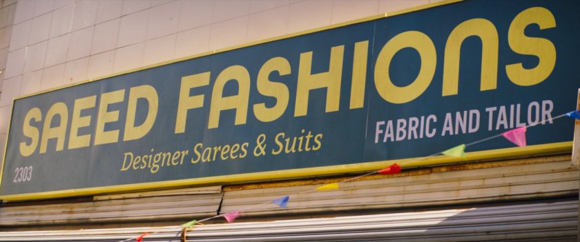Exterior of Saeed Fashions store and sign.