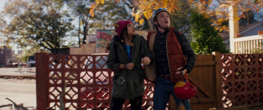 Kamala and Bruno outside the Khan house.