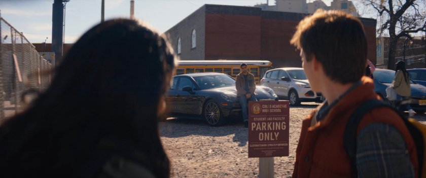 Kamala and Bruno see Kamran in parking lot across from Coles Academic High School.