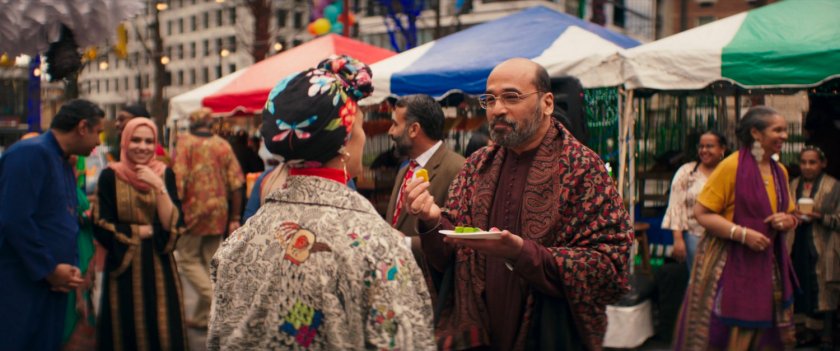 Nakia talks to Yusuf at the Eid Mubarak Fair.