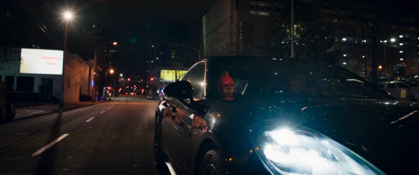 Kamala hops in a car.