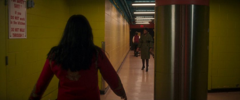 Kamala in a back hallway of wedding reception venue.