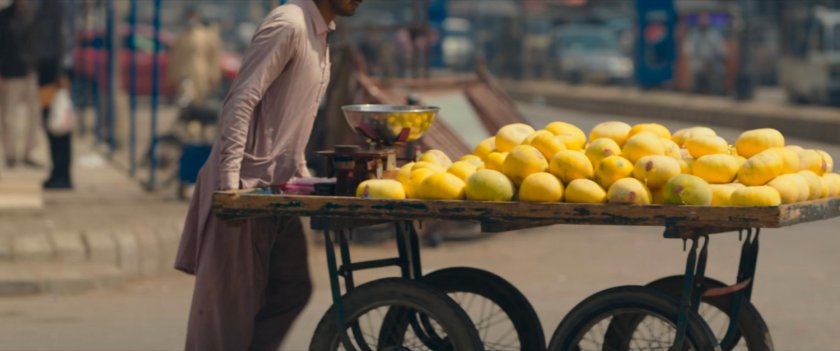 View of vendor on Karachi street.