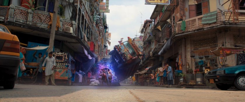 Kamala makes a ramp of hard light to flip a Super Savari tourist bus.