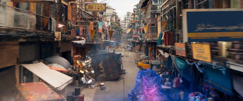 Kamala makes a ramp of hard light to flip a Super Savari tourist bus.