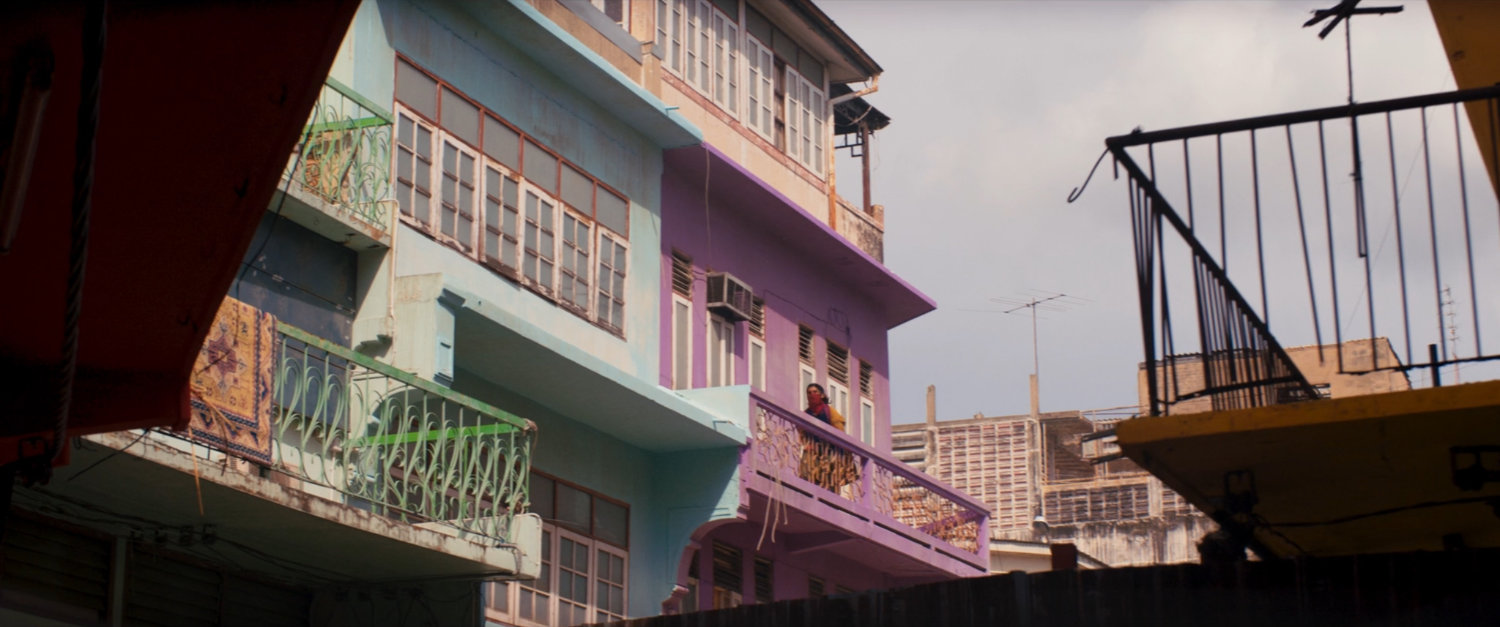 Colorful balconies on Karachi buildings.