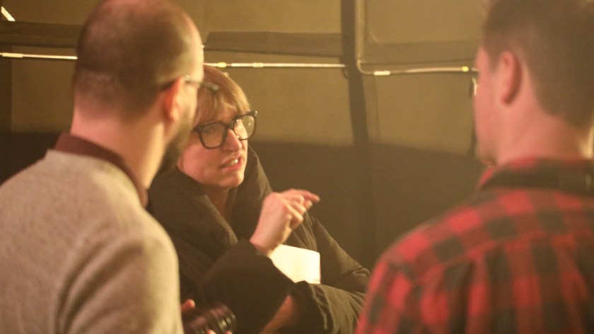 Director Cate Shortland speaks with members of the Perception team.