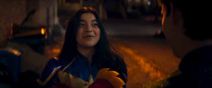 Kamala in an alley behind the mosque at night.