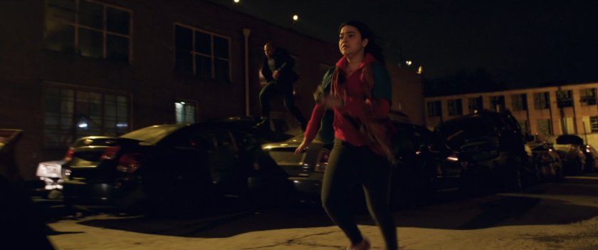 Kamela chased by Saleem in parking lot.