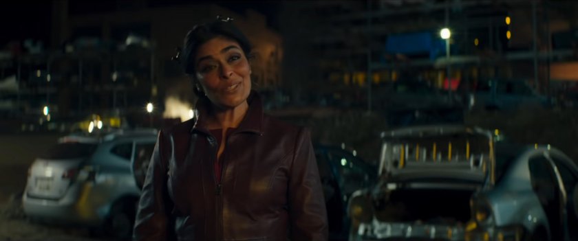 Najma in a junkyard.