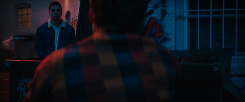 Bruno and Kamran in the alley behind the Circle Q store.