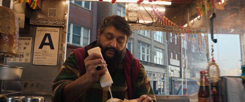 Najaf making gyros at his food truck.