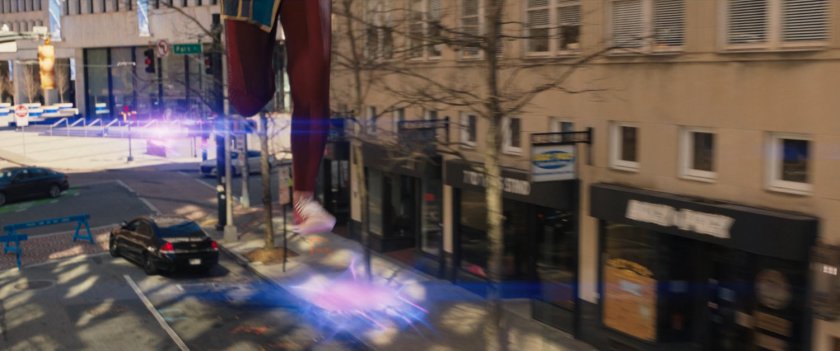 Ms Marvel runs through the city above the ground on platforms of hard light.