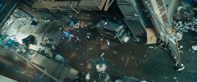 Ms Marvel protects Bruno and Kamran in an alley.