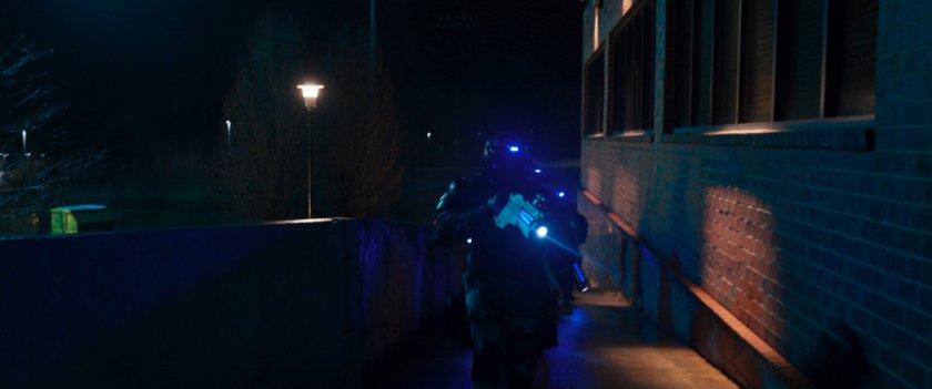 DODC guards outside of Coles Academic High School.