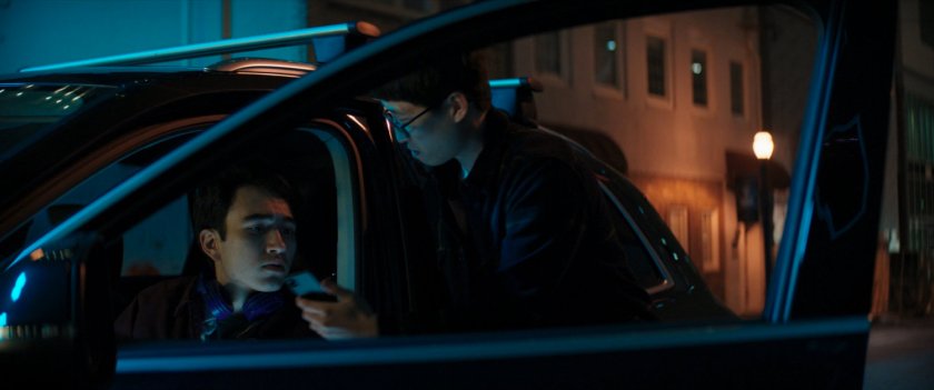 Two boys listen to Zoe's livestream from their car.