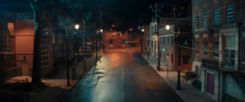 Nighttime exterior of Coles Academic High School.