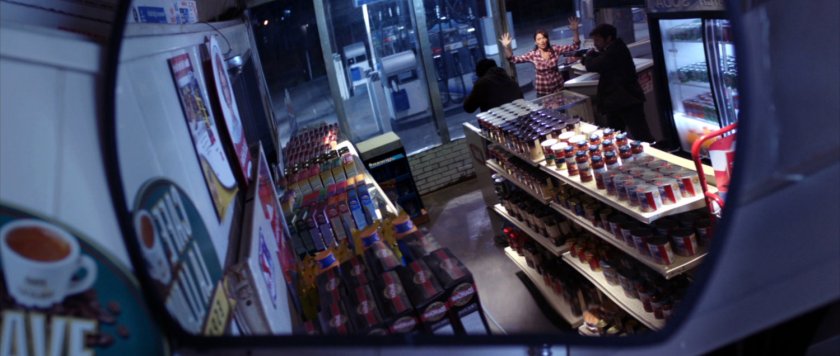 Interior of gas station as seen in convex mirror.