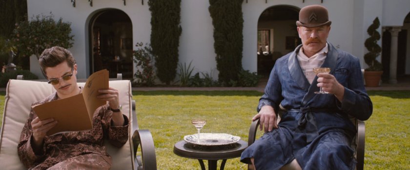 Howard Stark and Dum Dum Dugan outside his mansion.