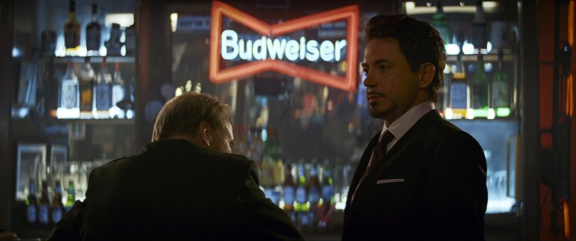 General Ross and Tony Stark inside a bar.
