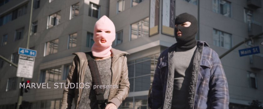 Benny and Claire outside bank.