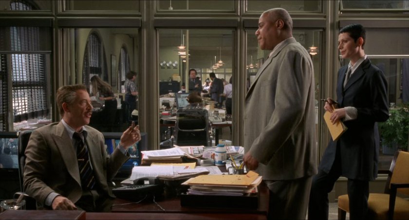 J Jonah Jameson and staff inside Daily Bugle offices.