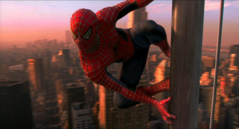 Spider-Man on side of skyscraper in New York.