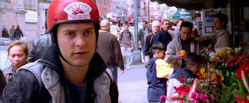 Peter Parker in front of Joe's Pizza.