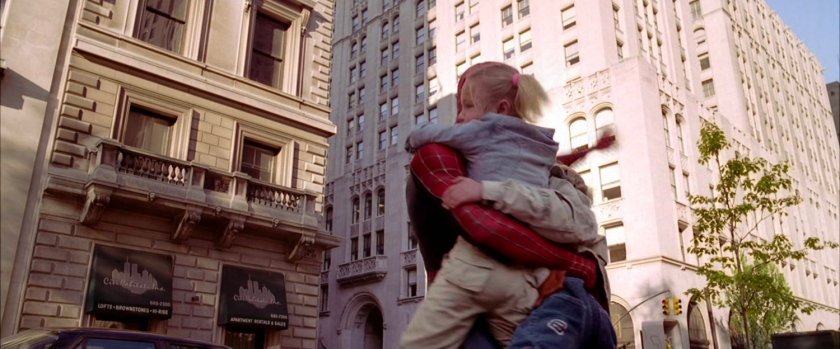 Spider-Man saves children from a car.