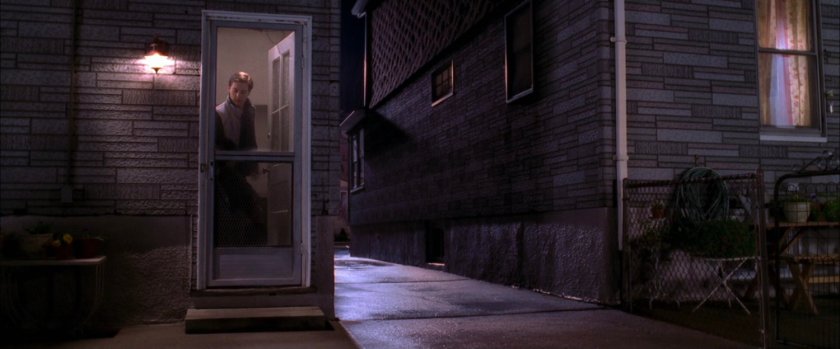 Back alley at Parker residence at night.