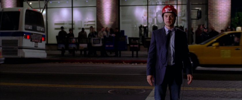 Peter Parker on street at night.