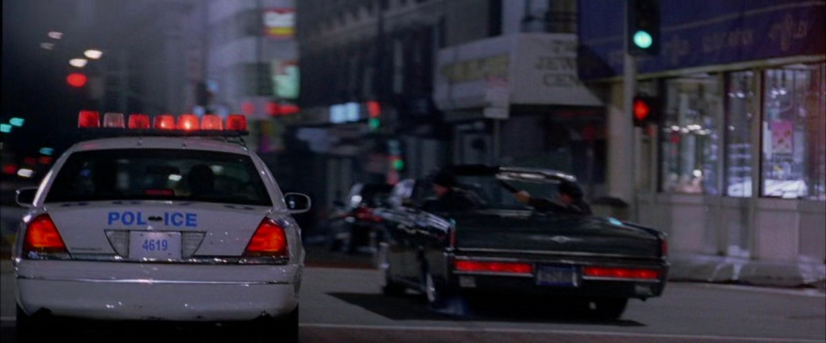 NYPD police car chases robbers.