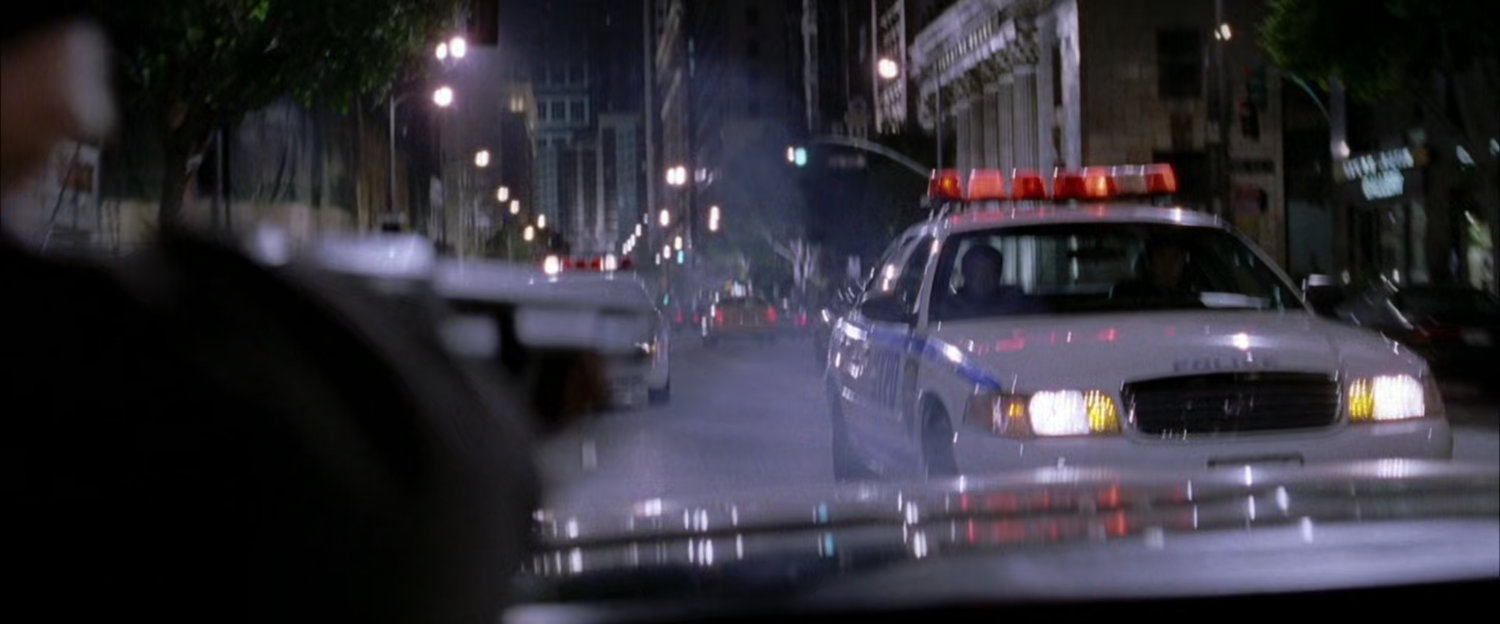 NYPD police car chases robbers.