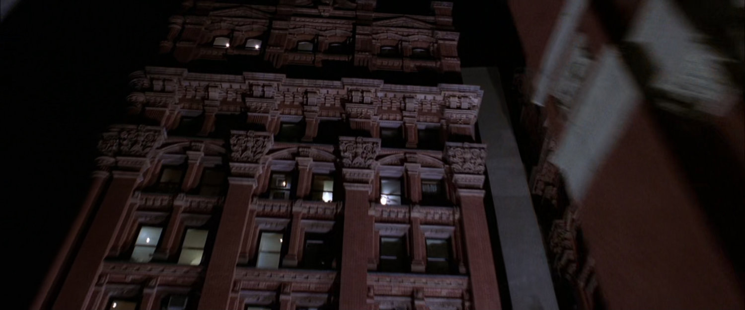 POV of building from alley.