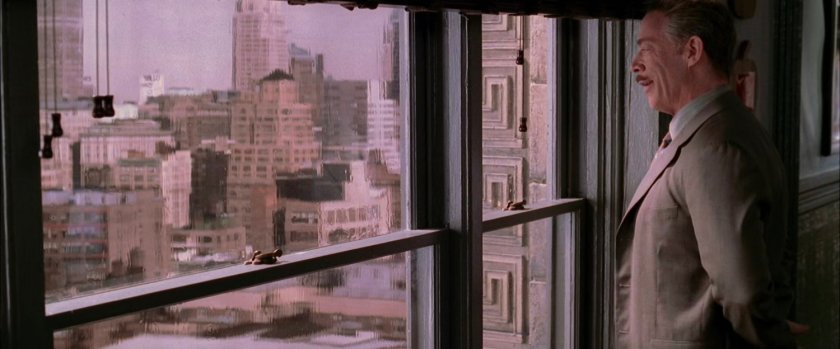 J Jonah Jameson looking out widow of Daily Bugle offices.