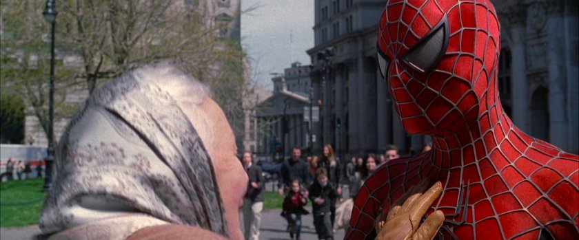 Spider-Man with Aunt May in park.