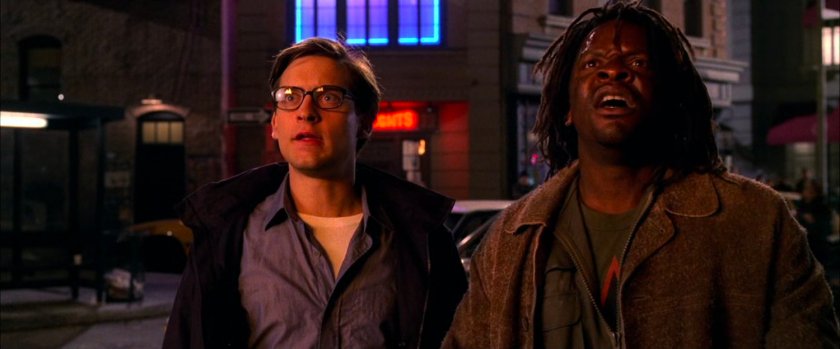 Peter Parker and onlooker witness apartment fire.