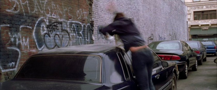 Peter Parker crashing into parked car.