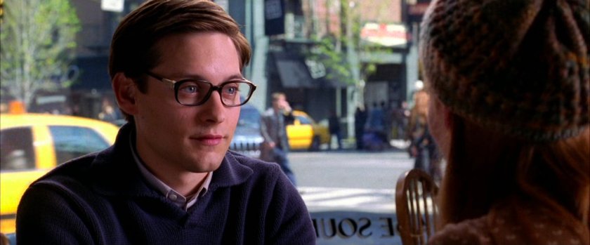 Peter Parker and Mary Jane sitting in cafe.