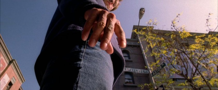 Looking up at Peter Parkers hand.