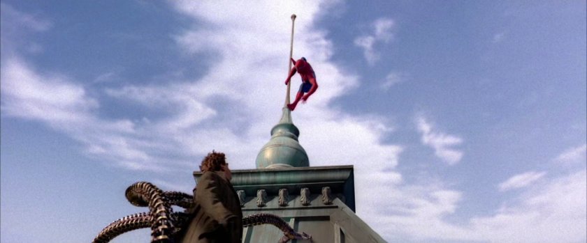 Spider-Man on flagpole fighting Doctor Octopus.